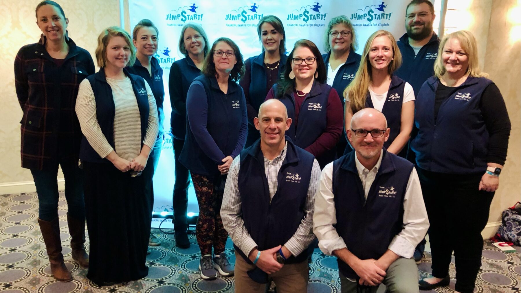 group of people pose for a photo