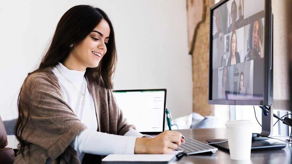 woman writes in a notebook